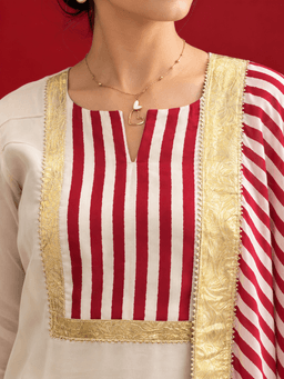 Ivory organza kurta with stripped satin salwar and dupatta view 2