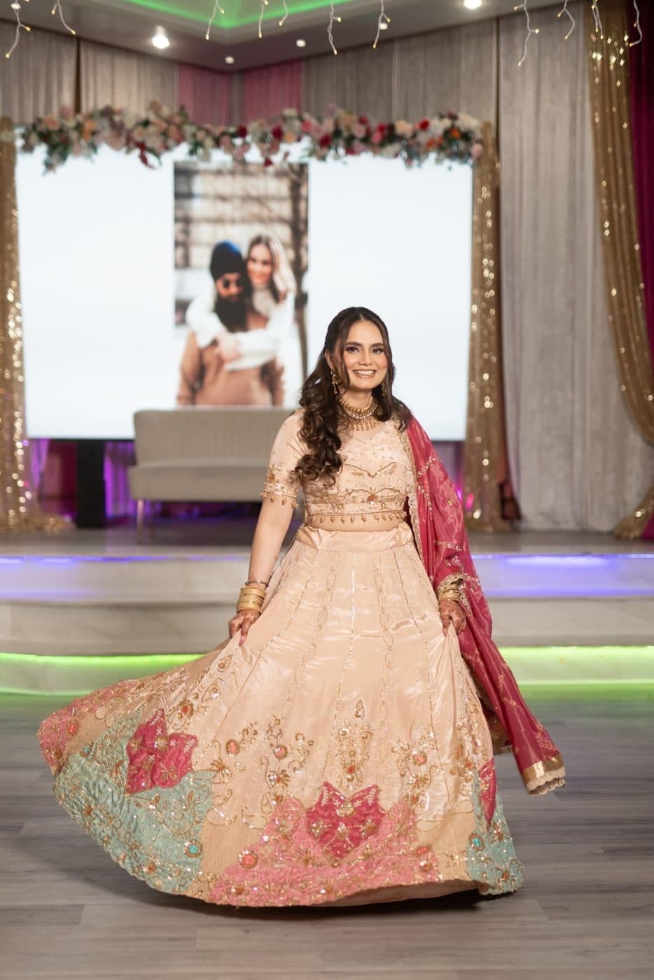 A customer wearing an outfit made at The Shree Boutique