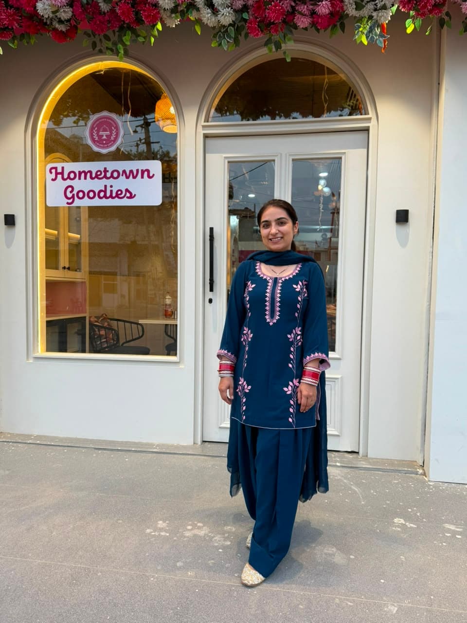 A customer wearing an outfit made at The Shree Boutique