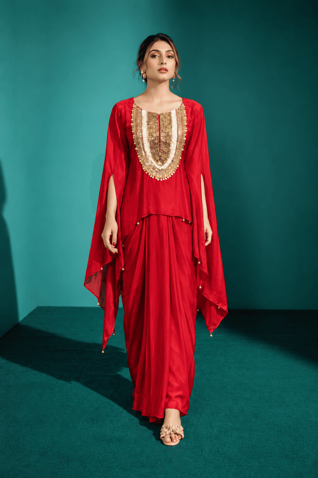 Red crepe draped skirt with embroided cape